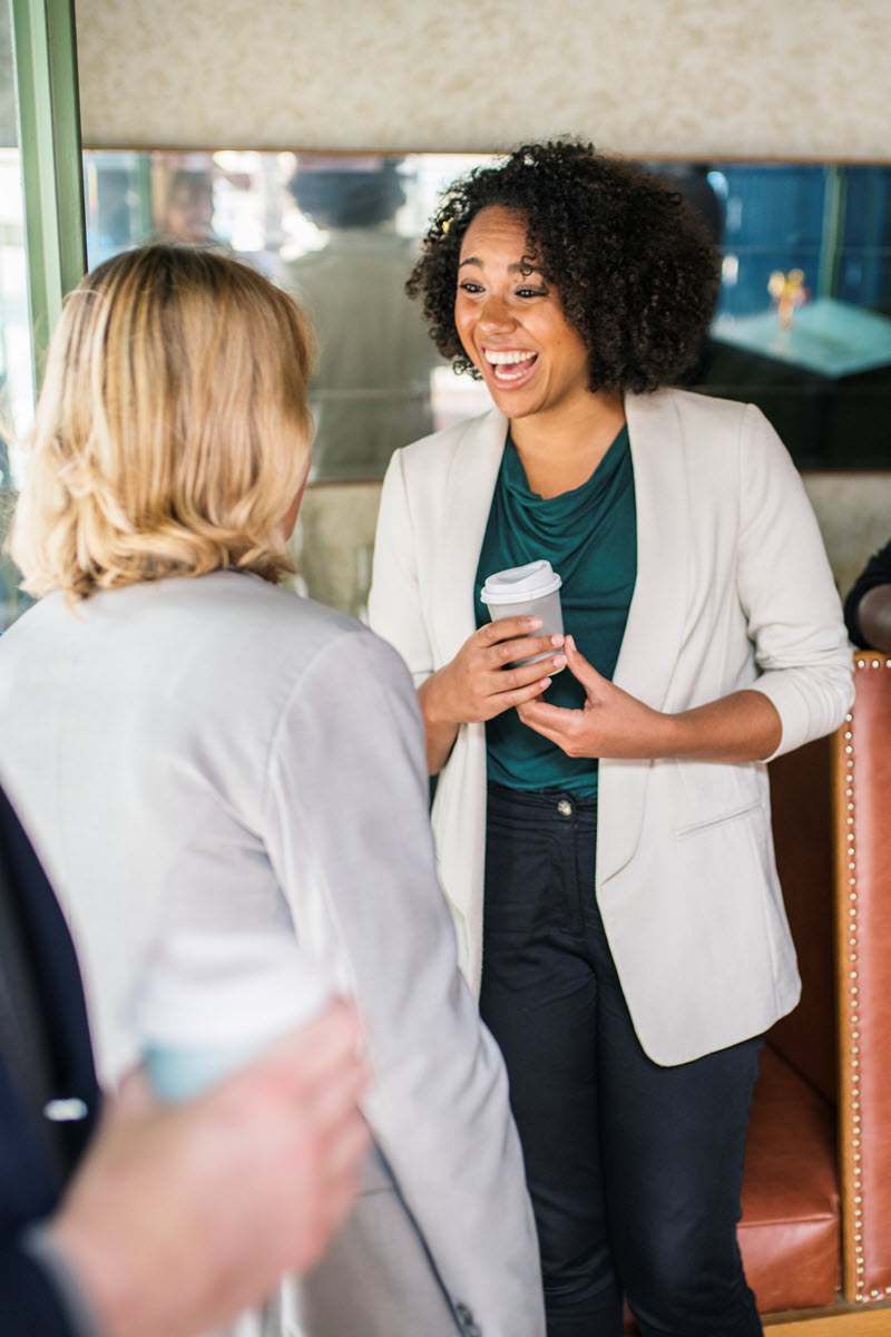 businesswomen-discussing-and-having-fun-2025-02-10-02-19-24-utc