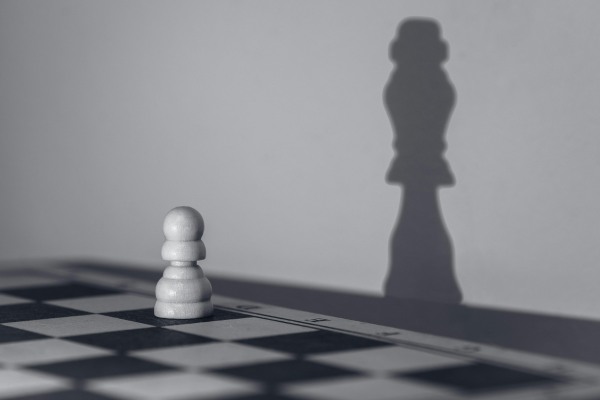 Business leader delegating tasks to team to build effective business systems