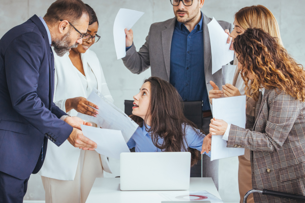 Illustration showing an overworked team caused by inefficient business systems